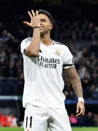 Rodrygo of Real Madrid celebrates scoring the opening goal Real Madrid v Atletico Madrid , UEFA Champions League, Round of 16, First Leg, Football, Santiago Bernabeu, Madrid, Spain - 04 Mar 2025 EDITORIAL USE ONLY No use with unauthorised audio, video, data, fixture lists, club league logos or live services. Online in-match use limited to 120 images, no video emulation. No use in betting, games or single club league player publications. Copyright: xRubenxAlbarran Shutterstockx 15178301at