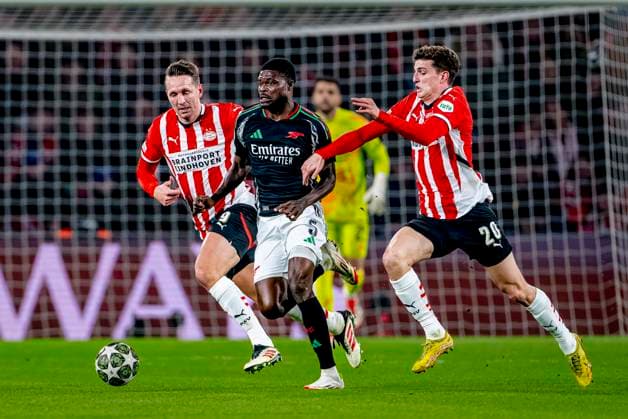 Arsenal midfielder Thomas Partey, PSV Eindhoven midfielder Guus Til during the match PSV - Arsenal at the Philips stadium for the UEFA Champions League- Round of 16 - 1st leg season 2024-2025 in EINDHOVEN, Netherlands on 4 march 2025, (photo by Marcel van Dorst EYE4images DeFodi Images)