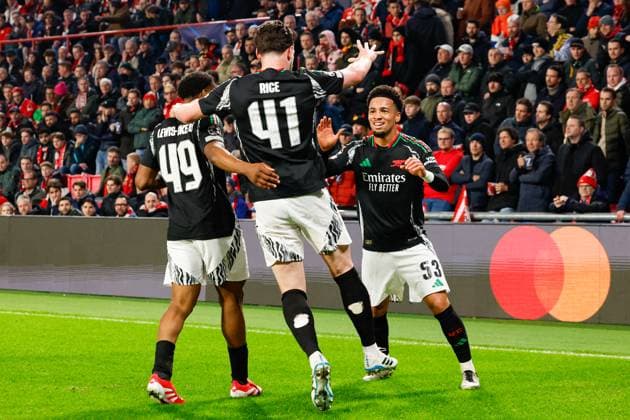 Ethan Nwaneri Arsenal FC celebrating the 0-2 with Myles Lewis-Skelly Arsenal FC and Declan Rice Arsenal FC , UEFA Champions League 2024 25 Round of 16 First Leg, PSV Eindhoven v Arsenal FC, Philips Stadion, March 4, 2025, Eindhoven, Netherlands.