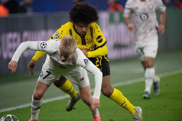 Karim-David ADEYEMI (DO) gegen Hakon HARALDSSON (LOSC) Aktion, Zweikampf, Fussball Champions League, Achtelfinale, Round of 16, Borussia Dortmund (DO) - OSC Lille (LOSC) am 04.03.2025 in Dortmund Deutschland. UEFA regulations prohibit any use of photographs as image sequences and or quasi-video Â
