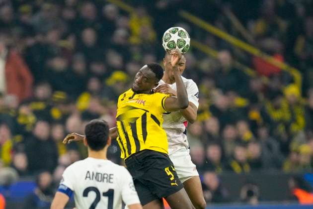 Serhou Guirassy (Borussia Dortmund) und Bafode Diakite (LOSC Lille) battle for the ball during the UEFA Champions League 2024 25 Round of 16 First Leg match between Borussia Dortmund and LOSC Lille at Signal Iduna Park on March 4, 2025 in Dortmund, Germany.