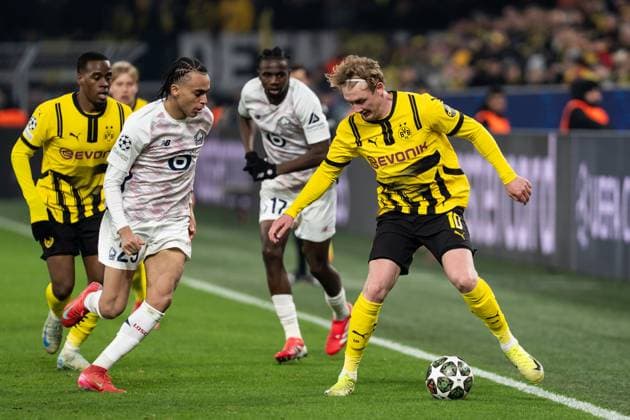 GER, UEFA Champions League, Borussia Dortmund vs OSC Lille 04.03.2025, Signal Iduna Park, Dortmund, GER, UEFA Champions League, Borussia Dortmund vs OSC Lille Im Bild: Zweikampf zwischen Ethan MbappÃ Mbappe (OSC Lille, 29) und Julian Brandt (BV Borussia Dortmund, 10)