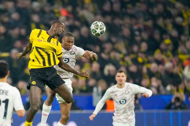 Serhou Guirassy (Borussia Dortmund) und Bafode Diakite (LOSC Lille) battle for the ball during the UEFA Champions League 2024 25 Round of 16 First Leg match between Borussia Dortmund and LOSC Lille at Signal Iduna Park on March 4, 2025 in Dortmund, Germany.