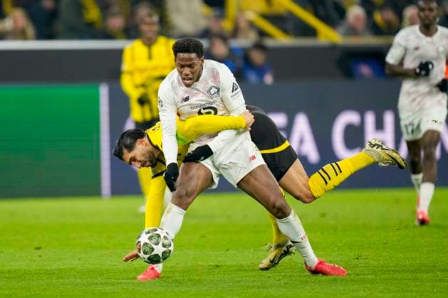 Emre Can (Borussia Dortmund) und Jonathan David (LOSC Lille) battle for the ball during the UEFA Champions League 2024 25 Round of 16 First Leg match between Borussia Dortmund and LOSC Lille at Signal Iduna Park on March 4, 2025 in Dortmund, Germany.