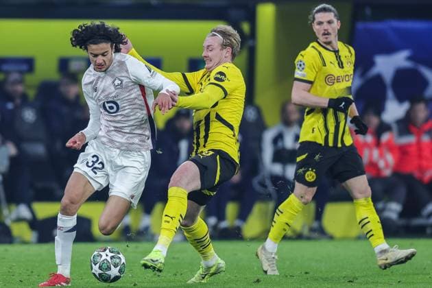 Fußball Champions League Achtelfinale Borussia Dortmund - Lille OSC am 04.03.2025 im Signal Iduna Park in Dortmund Ayyoub Bouaddi ( Lille ), links - Julian Brandt ( Dortmund ), rechts