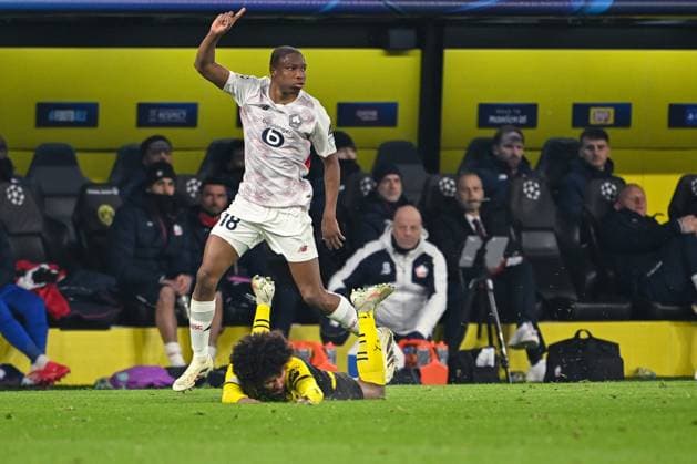 04.03.2025, Fussball UEFA Champions League 2024 2025, Achtelfinale, Borussia Dortmund - Lille OSC, im Signal-Iduna-Park, Karim Adeyemi (Borussia Dortmund), BafodÃ DiakitÃ (OSC Lille)