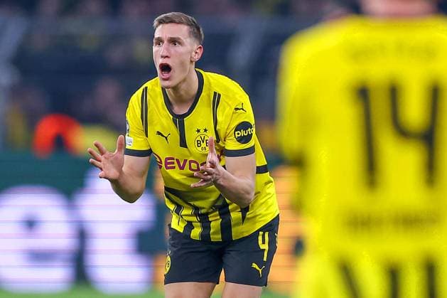 04.03.2025, Fußball, UEFA Champions League, Borussia Dortmund - OSC Lille, Signal Iduna Park, Runde der 16, Saison 2024 2025: Nico Schlotterbeck (BVB 4) gestikulierend auf dem Spielfeld Nordrhein-Westfalen Deutschland