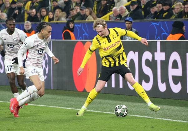 04.03.2025, xgrfx, Fussball UEFA Champions League, Borussia Dortmund - Lille OSC v.l. Ethan Mbappe (Lille OSC), Julian Brandt (Borussia Dortmund) (DFL DFB REGULATIONS PROHIBIT ANY USE OF PHOTOGRAPHS as IMAGE SEQUENCES and or QUASI-VIDEO) Dortmund