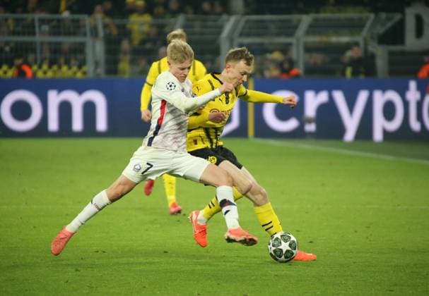 04.03.2025, xgrfx, Fussball UEFA Champions League, Borussia Dortmund - Lille OSC v.l. Hakon Haraldsson (Lille OSC), Maximilian Beier (Borussia Dortmund) (DFL DFB REGULATIONS PROHIBIT ANY USE OF PHOTOGRAPHS as IMAGE SEQUENCES and or QUASI-VIDEO) Dortmund