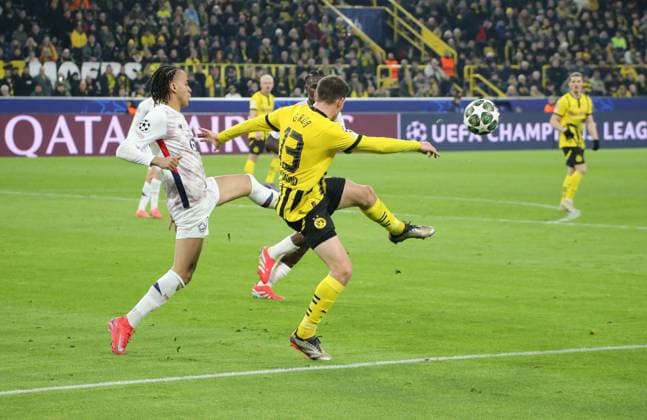 04.03.2025, xgrfx, Fussball UEFA Champions League, Borussia Dortmund - Lille OSC v.l. Ethan Mbappe (Lille OSC), Pascal Groß (Borussia Dortmund) (DFL DFB REGULATIONS PROHIBIT ANY USE OF PHOTOGRAPHS as IMAGE SEQUENCES and or QUASI-VIDEO) Dortmund