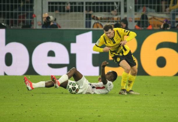 04.03.2025, xgrfx, Fussball UEFA Champions League, Borussia Dortmund - Lille OSC v.l. Ngal Ayel Mukau (Lille OSC), Pascal Groß (Borussia Dortmund) (DFL DFB REGULATIONS PROHIBIT ANY USE OF PHOTOGRAPHS as IMAGE SEQUENCES and or QUASI-VIDEO) Dortmund