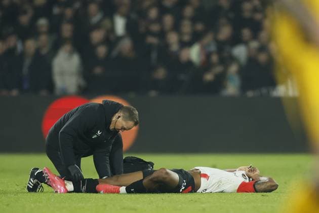 ROTTERDAM - Jeyland Mitchell of Feyenoord is injured during the UEFA Champions League match between Feyenoord and Internazionale Milan at Feyenoord Stadium de Kuip on March 5, 2025 in Rotterdam, Netherlands. ANP KOEN VAN WEEL UEFA Champions League 2024 25 Round of 16 First leg 2024 25 xVIxANPxSportx xxANPxIVx 521641474 originalFilename: 521641474.jpg