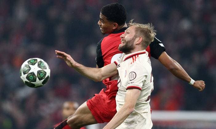 Adli - Laimer , Bayern München-Bayer Leverkusen , UEFA Champions League, Achtelfinale , Fußball , in der Allianz Arena , München , Bayern , Deutschland . März 05, 2025 . Photo by: Davide Elias Ipa Photo Pressefoto DENL Copyright: xDavidexEliasx