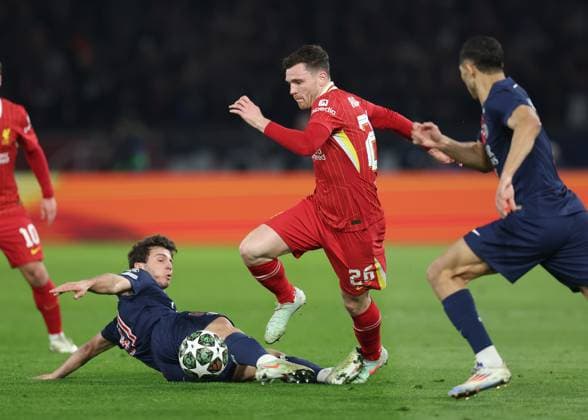 Paris, France, 5th March 2025. Andrew Robertson of Liverpool is challenged by Joao Neves of Paris St Germain during the UEFA Champions League match Paris Saint Germain vs Liverpool at Le Parc des Princes, Paris. Picture credit should read: Paul Terry Sportimage EDITORIAL USE ONLY. No use with unauthorised audio, video, data, fixture lists, club league logos or live services. Online in-match use limited to 120 images, no video emulation. No use in betting, games or single club league player publications. SPI_018_PT_PSG_Liverpool SPI-3726-0018