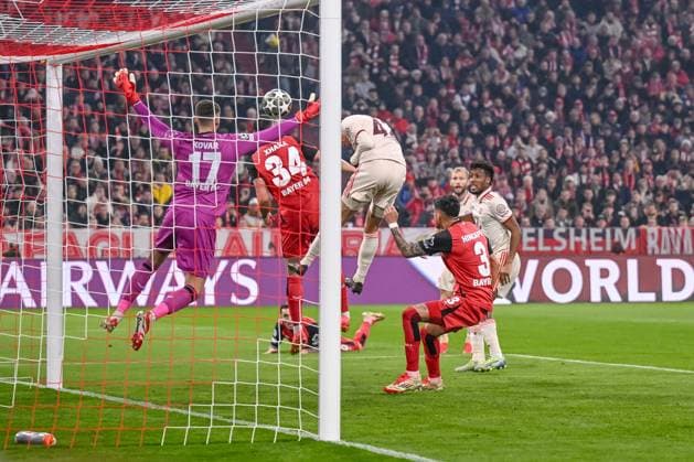 Torwart Matej Kovar (Bayer 04 Leverkusen), Granit Xhaka (Bayer 04 Leverkusen) und Jamal Musiala (FC Bayern Muenchen) battle for the ball during the UEFA Champions League 2024 25 Round of 16 First Leg match between FC Bayern München and Bayer 04 Leverkusen at Allianz Arena on March 5, 2025 in Munich, Germany. (Photo by Harry Langer DeFodi Images)