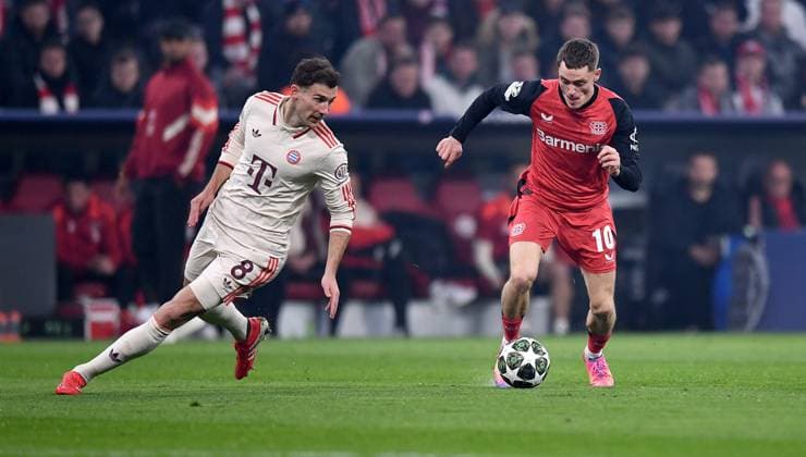 FUSSBALL CHAMPIONS LEAGUE SAISON 2024 2025 Achtelfinal Hinspiel FC Bayern Muenchen - Bayer 04 Leverkusen 05.03.2025 Leon Goretzka (li, FC Bayern Muenchen) gegen Florian Wirtz (re, Bayer 04 Leverkusen)