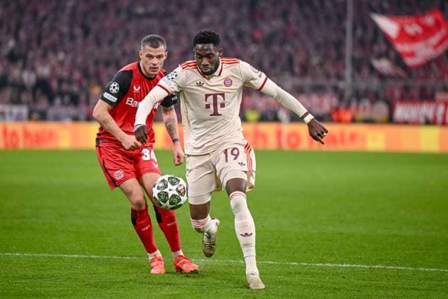 Granit Xhaka (Bayer 04 Leverkusen) und Alphonso Davies (FC Bayern Muenchen) battle for the ball during the UEFA Champions League 2024 25 Round of 16 First Leg match between FC Bayern München and Bayer 04 Leverkusen at Allianz Arena on March 5, 2025 in Munich, Germany. (Photo by Harry Langer DeFodi Images)