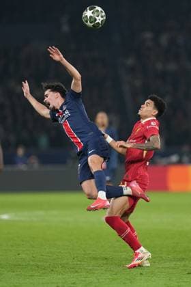 Luis Diaz of Liverpool out muscles Vitinha of PSG Paris Saint-Germain v Liverpool, UEFA Champions League, Round of 16, First Leg, Football, Parc des Princes, Paris, France - 05 Mar 2025 EDITORIAL USE ONLY No use with unauthorised audio, video, data, fixture lists, club league logos or live services. Online in-match use limited to 120 images, no video emulation. No use in betting, games or single club league player publications. Copyright: xDavexWinter Shutterstockx 15178313bb