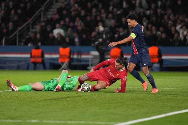 A mad scramble in the penalty area as Darwin Nunez of Liverpool, Marquinhos of PSG and Gianluigi Donnarumma of PSG all compete for a loose ball Paris Saint-Germain v Liverpool, UEFA Champions League, Round of 16, First Leg, Football, Parc des Princes, Paris, France - 05 Mar 2025 EDITORIAL USE ONLY No use with unauthorised audio, video, data, fixture lists, club league logos or live services. Online in-match use limited to 120 images, no video emulation. No use in betting, games or single club league player publications. Copyright: xDavexWinter Shutterstockx 15178313br