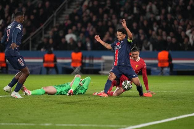 A mad scramble in the penalty area as Darwin Nunez of Liverpool, Marquinhos of PSG and Gianluigi Donnarumma of PSG all compete for a loose ball Paris Saint-Germain v Liverpool, UEFA Champions League, Round of 16, First Leg, Football, Parc des Princes, Paris, France - 05 Mar 2025 EDITORIAL USE ONLY No use with unauthorised audio, video, data, fixture lists, club league logos or live services. Online in-match use limited to 120 images, no video emulation. No use in betting, games or single club league player publications. Copyright: xDavexWinter Shutterstockx 15178313bt