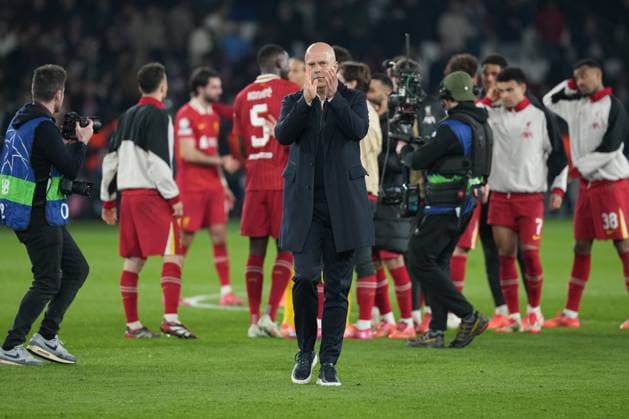Liverpool coach Arne Slot applauds the travelling fans at the end of the match after his side wins 1-0 Paris Saint-Germain v Liverpool, UEFA Champions League, Round of 16, First Leg, Football, Parc des Princes, Paris, France - 05 Mar 2025 EDITORIAL USE ONLY No use with unauthorised audio, video, data, fixture lists, club league logos or live services. Online in-match use limited to 120 images, no video emulation. No use in betting, games or single club league player publications. Copyright: xDavexWinter Shutterstockx 15178313ck