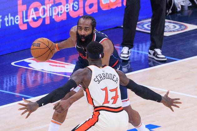 March 5, 2025, Inglewood, California, USA: James Harden 1 of the Los Angeles Clippers is defended by Dennis Schroder 17 of the Detroit Pistons during their regular season NBA, Basketball Herren, USA game on Wednesday March 5, 2025 at Intuit Dome Arena in Inglewood, California. Clippers defeat Pistons, 123-115. JAVIER ROJAS PI Inglewood USA - ZUMAp124 20250305_zaa_p124_072 Copyright: xJavierxRojasx