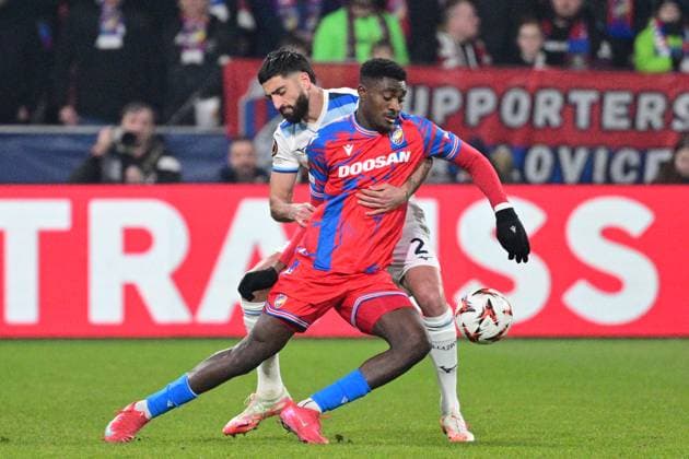 L-R Rafiu Durosinmi (Plzen) and Samuel Gigot (Lazio) in action during the UEFA Europa League, semi-finals opening match: FC Viktoria Plzen vs Lazio, in Pilsen, Czech Republic, on March 6, 2025. (CTKxPhoto MichalxKamaryt) CTKPhotoP2025030609333  CTKPhotoP2025030609333