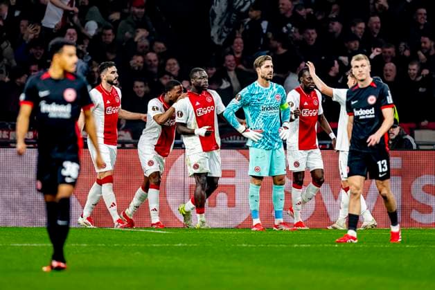 AFC Ajax Amsterdam forwarder Brian Brobbey scores the 1-0 and celebrating the goal, Eintracht Frankfurt goalkeeper Kevin Trapp dejected during the match Ajax - Eintracht at the Johan Cruijff ArenA for the UEFA Europa League - Round of 16 - 1st leg season 2024-2025 in AMSTERDAM, Netherlands on 6 march 2025, (photo by Marcel van Dorst EYE4images DeFodi Images)