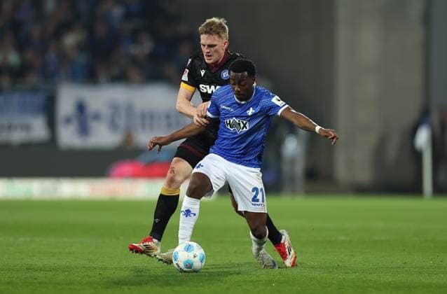 07.03.2025, xdcx, Fussball 2. Bundesliga, SV Darmstadt 98 - Karlsruher SC, emonline, emspor, despor, v.l., Mikkel Kaufmann (Karlsruher SC), Merveille Papela (SV Darmstadt 98) DFL DFB REGULATIONS PROHIBIT ANY USE OF PHOTOGRAPHS AS IMAGE SEQUENCES AND OR QUASI-VIDEO.