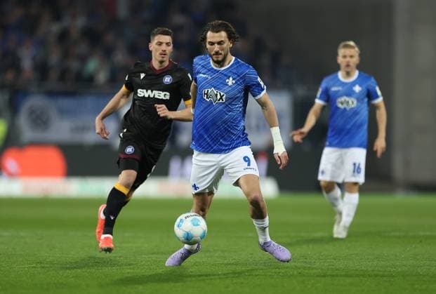 07.03.2025, xdcx, Fussball 2. Bundesliga, SV Darmstadt 98 - Karlsruher SC, emonline, emspor, despor, v.l., Nicolai Rapp (Karlsruher SC), Fraser Hornby (SV Darmstadt 98) DFL DFB REGULATIONS PROHIBIT ANY USE OF PHOTOGRAPHS AS IMAGE SEQUENCES AND OR QUASI-VIDEO.