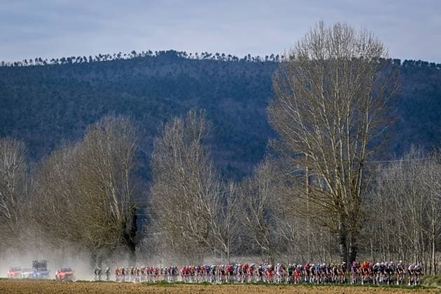The pack of riders pictured in action during the men elite Strade Bianche one day cycling race, 213km from and to Siena, Italy on Saturday 08 March 2025. DIRKxWAEM  x114492239x