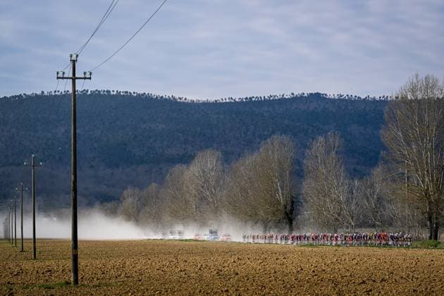 The pack of riders pictured in action during the men elite Strade Bianche one day cycling race, 213km from and to Siena, Italy on Saturday 08 March 2025. DIRKxWAEM  x114492240x