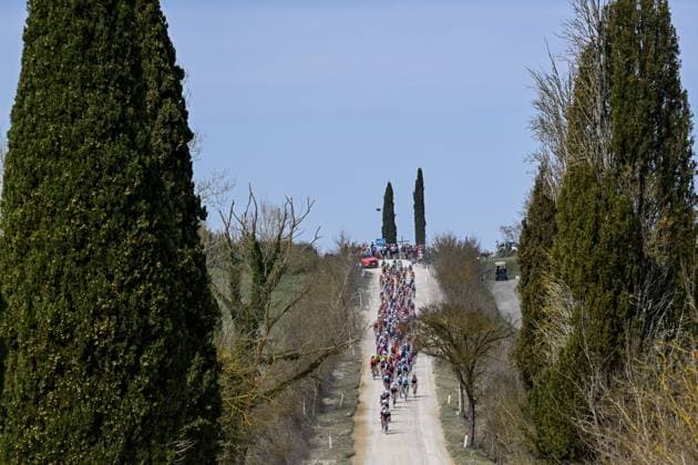 The pack of riders pictured in action during the men elite Strade Bianche one day cycling race, 213km from and to Siena, Italy on Saturday 08 March 2025. DIRKxWAEM  x114492296x