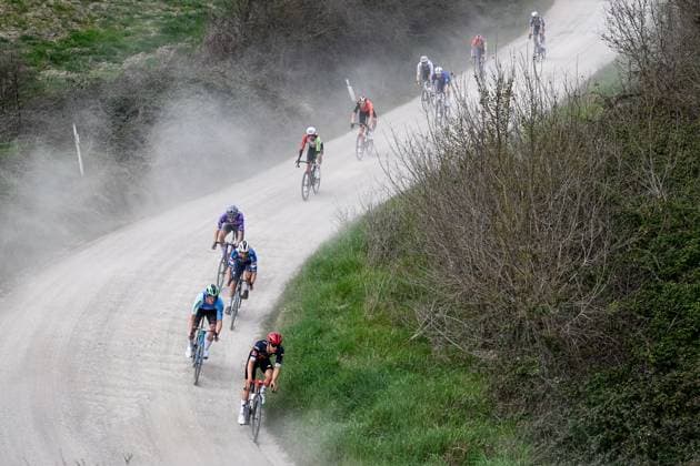 Swiss Fabian Weiss of Tudor Pro Cycling Team and Belgian Stan Dewulf of Decathlon AG2R La Mondiale Team pictured in action during the men elite Strade Bianche one day cycling race, 213km from and to Siena, Italy on Saturday 08 March 2025. DIRKxWAEM  x114493073x
