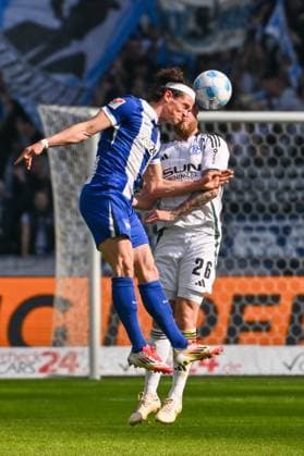 Fussball 2.Bundesliga, Hertha BSC Berlin - FC Schalke 04 08.03.2025, xdanx, Fussball 2.Bundesliga, Hertha BSC Berlin - FC Schalke 04 v.l. Fabian Reese (Hertha BSC 11),Tomas Kalas (FC Schalke 04 26), Zweikampf, Duell, Kampf, tackle (DFL DFB REGULATIONS PROHIBIT ANY USE OF PHOTOGRAPHS as IMAGE SEQUENCES and or QUASI-VIDEO) Daniel Lakomski Mix1 Berlin Olympiastadion Berlin Deutschland (DEU)