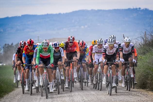 Italian Alberto Bettiol of XDS Astana Team and Slovenian Tadej Pogacar of UAE Team Emirates pictured in action during the men elite Strade Bianche one day cycling race, 213km from and to Siena, Italy on Saturday 08 March 2025. DIRKxWAEM  x114494029x