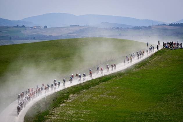 The pack of riders pictured in action during the men elite Strade Bianche one day cycling race, 213km from and to Siena, Italy on Saturday 08 March 2025. DIRKxWAEM  x114494415x