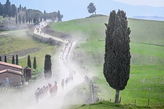 The pack of riders pictured in action during the men elite Strade Bianche one day cycling race, 213km from and to Siena, Italy on Saturday 08 March 2025. DIRKxWAEM  x114495417x