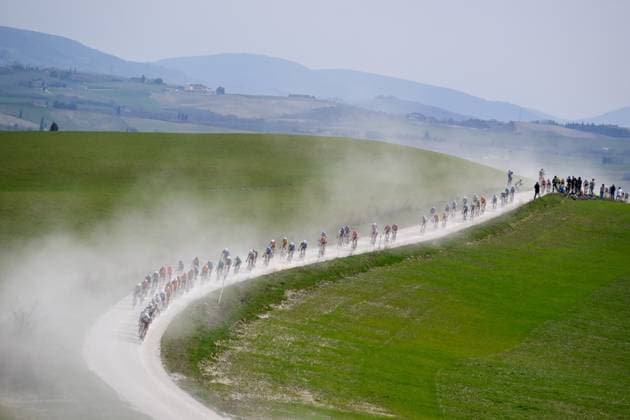 The pack of riders pictured in action during the men elite Strade Bianche one day cycling race, 213km from and to Siena, Italy on Saturday 08 March 2025. DIRKxWAEM  x114495769x