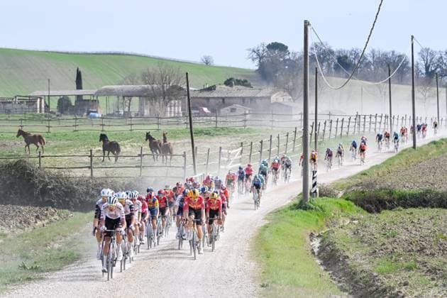 The pack of riders pictured in action during the men elite Strade Bianche one day cycling race, 213km from and to Siena, Italy on Saturday 08 March 2025. DIRKxWAEM  x114496185x