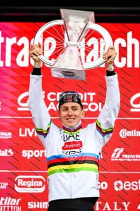 Slovenian Tadej Pogacar of UAE Team Emirates celebrates on the podium after winning the men elite Strade Bianche one day cycling race, 213km from and to Siena, Italy on Saturday 08 March 2025. DIRKxWAEM  x114506653x