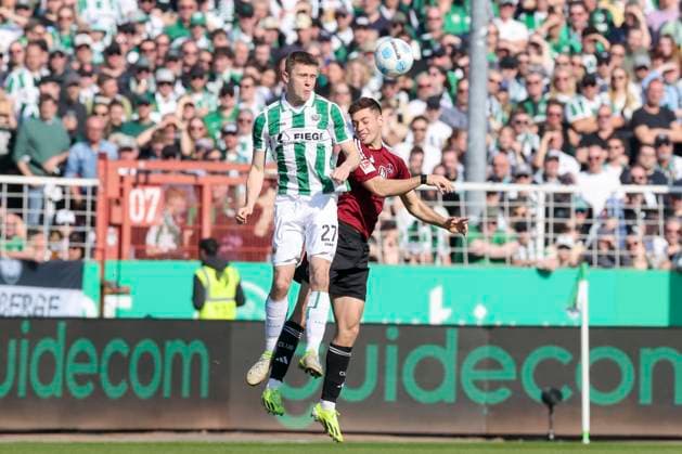 Jano Ter Horst (SC Preussen Muenster) und Stefanos Tzimas (1. FC Nuernberg) kaempfen um den Ball, 2. Bundesliga, Preußen Münster vs 1. FC Nürnberg, Preußenstadion am 09. March 2025 in Münster, Deutschland. (Foto von Marco Steinbrenner DeFodi Images) Jano Ter Horst (SC Preussen Muenster) und Stefanos Tzimas (1. FC Nuernberg) battle for the ball, 2. Bundesliga, Preußen Münster vs 1. FC Nürnberg, Preußenstadion, March 9, 2025 in Münster, Germany. (Photo by Marco Steinbrenner DeFodi Images) DFB DFL REGULATIONS PROHIBIT ANY USE OF PHOTOGRAPHS AS IMAGE SEQUENCES AND OR QUASI-VIDEO.