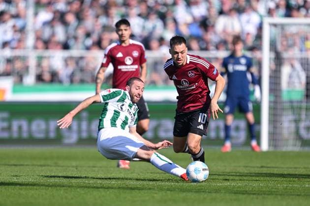 09.03.2025, Fussball, 2. Bundesliga, 25. Spieltag Saison 2024 2025, Preußen Münster - 1.FC Nürnberg, Rico Preißinger (SC Preussen Münster), Julian Justvan (1. FC Nürnberg) xRHR-FOTO TKx