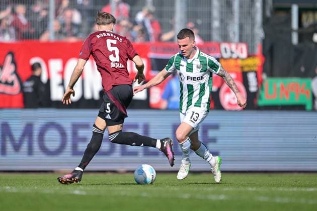 09.03.2025, Fussball, 2. Bundesliga, 25. Spieltag Saison 2024 2025, Preußen Münster - 1.FC Nürnberg, Tim Drexler (1. FC Nürnberg), Florian Pick (SC Preussen Münster) xRHR-FOTO TKx