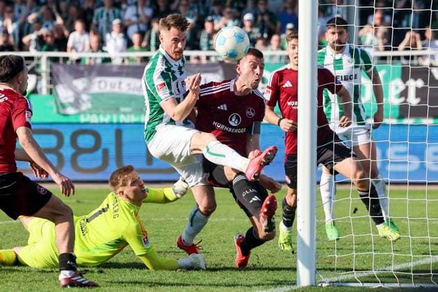Charalambos Makridis (SC Preussen Muenster) und Robin Knoche (1. FC Nuernberg) kaempfen um den Ball, 2. Bundesliga, Preußen Münster vs 1. FC Nürnberg, Preußenstadion am 09. March 2025 in Münster, Deutschland. (Foto von Marco Steinbrenner DeFodi Images) Charalambos Makridis (SC Preussen Muenster) und Robin Knoche (1. FC Nuernberg) battle for the ball, 2. Bundesliga, Preußen Münster vs 1. FC Nürnberg, Preußenstadion, March 9, 2025 in Münster, Germany. (Photo by Marco Steinbrenner DeFodi Images) DFB DFL REGULATIONS PROHIBIT ANY USE OF PHOTOGRAPHS AS IMAGE SEQUENCES AND OR QUASI-VIDEO.