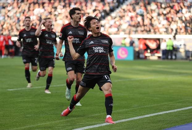 Sport Themen der Woche KW10 Sport Bilder des Tages 09.03.2025, Fussball Bundesliga, Eintracht Frankfurt - 1. FC Union Berlin, v.l., Torjubel zum 1:2 durch Woo-yeong Jeong (1. FC Union Berlin), Goal celebration, celebrate the goal DFL DFB REGULATIONS PROHIBIT ANY USE OF PHOTOGRAPHS AS IMAGE SEQUENCES AND OR QUASI-VIDEO. xdcx *** 09 03 2025, Soccer Bundesliga, Eintracht Frankfurt 1 FC Union Berlin, v l , Goal celebration, celebrate the goal DFL DFB REGULATIONS PROHIBIT ANY USE OF PHOTOGRAPHS AS IMAGE SEQUENCES AND OR QUASI VIDEO xdcx Copyright: HMBxMedia Claus