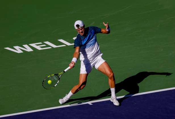 March 09, 2025 Holger Rune (DEN) returns a shot against Ugo Humbert (FRA) during the 2025 BNP Paribas Open at Indian Wells Tennis Garden in Indian Wells, California. Mandatory Photo Credit: CSM Indian Wells United States of America - ZUMAc04_ 20250309_zma_c04_189 Copyright: xCharlesxBausx