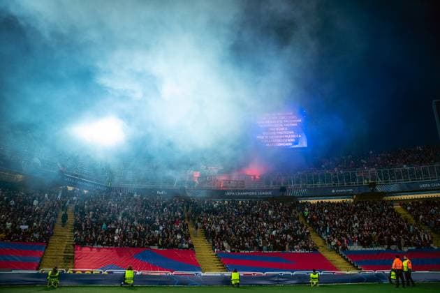 Spain-Football-Champions League FC Barcelona, Barca v SL Benfica in Barcelona, Spain. Barcelona, Spain, 11, March, 2025. Spain-Football-Champions League FC Barcelona v SL Benfica. Benfica supporters with light flares in the stands. Barcelona Olympic Stadium Lluis Companys Barcelona Spain