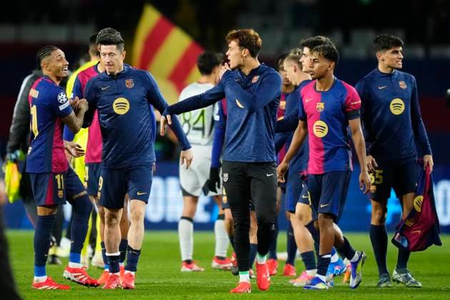 FC Barcelona, Barca v SL Benfica - UEFA Champions League 2024 25 Round of 16 Second Leg Barcelona players celebrate the victory after winning the UEFA Champions League 2024 25 Round of 16 Second Leg match between FC Barcelona and SL Benfica at Estadi Olimpic Lluis Companys on March 11, 2025 in Barcelona, Spain. Barcelona Spain  Copyright: xJosexBretonx originalFilename:bretonhernandez-fcbarcel250311_npMuS.jpg