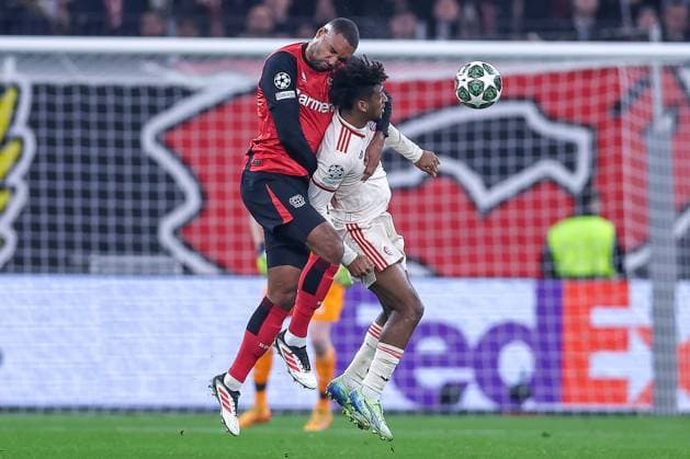 11.03.2025, Fußball, UEFA Champions League, Bayer 04 Leverkusen - FC Bayern München, Achtelfinale Rückspiel, BayArena, Saison 2024 2025: Jonathan Tah (Bayer04 Leverkusen 4) im Zweikampf gegen Kingsley Coman (FC Bayern 11) DFB regulations prohibit any use of photographs as image sequences and or quasi-video. Nordrhein-Westfalen Deutschland
